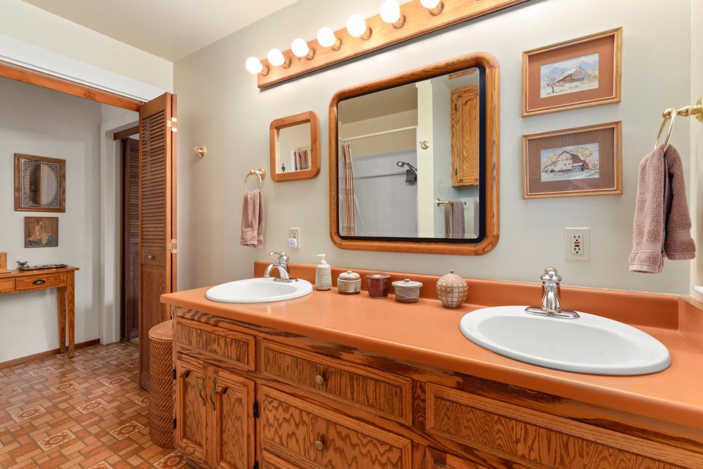 875 Amesti Road Watsonville, CA 95076 - Photo 21 of 52 a bathroom with 2 sink and a mirror