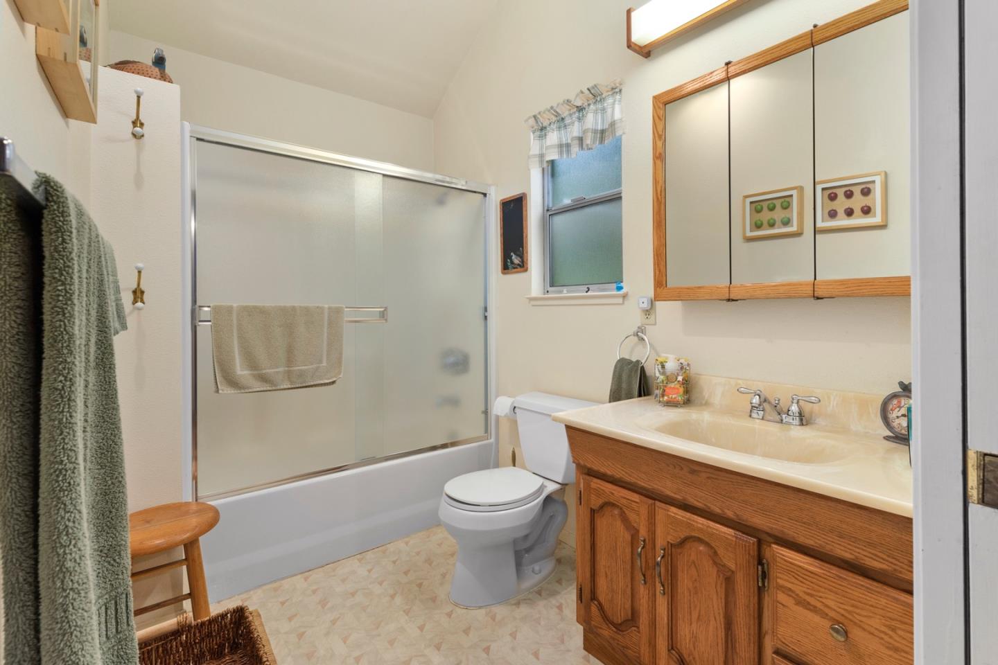 875 Amesti Road Watsonville, CA 95076 - Photo 25 of 52 a bathroom with a sink a toilet and shower