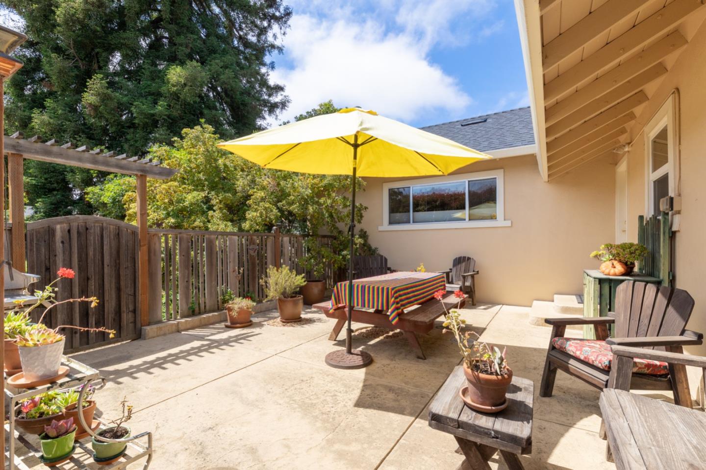 875 Amesti Road Watsonville, CA 95076 - Photo 30 of 52 a view of backyard with a patio and outdoor seating