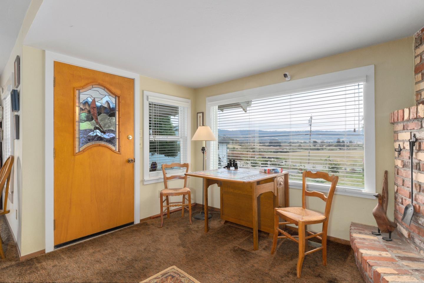 875 Amesti Road Watsonville, CA 95076 - Photo 6 of 52 a dining room with furniture and a window