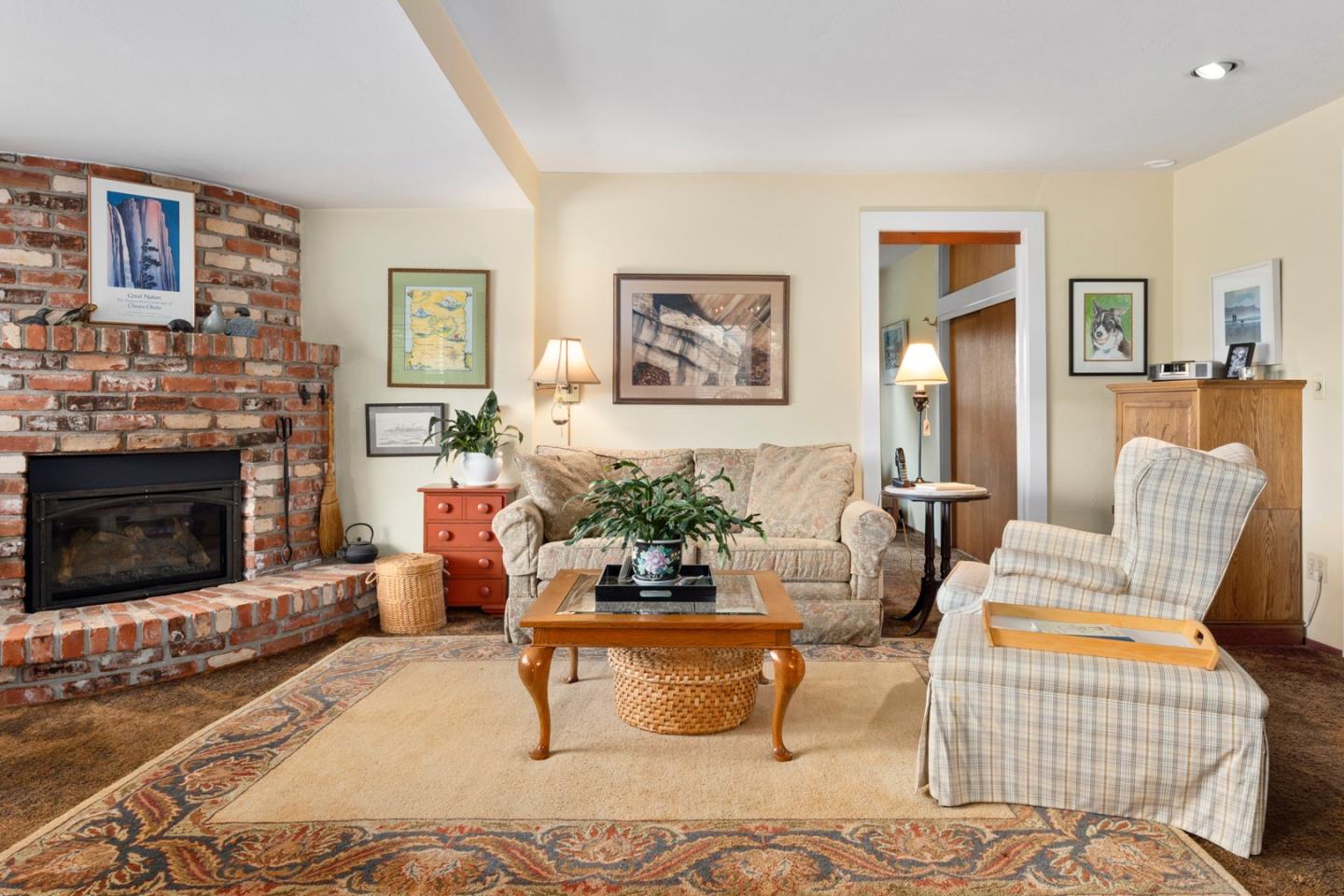 875 Amesti Road Watsonville, CA 95076 - Photo 7 of 52 a living room with furniture and a fireplace