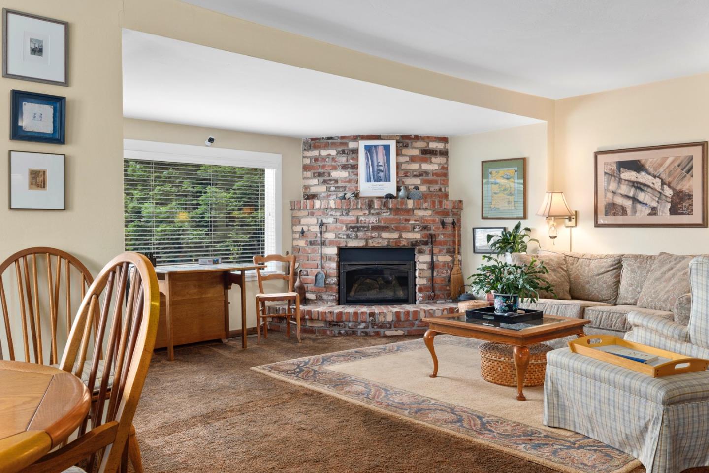 875 Amesti Road Watsonville, CA 95076 - Photo 8 of 52 a living room with furniture and a fireplace