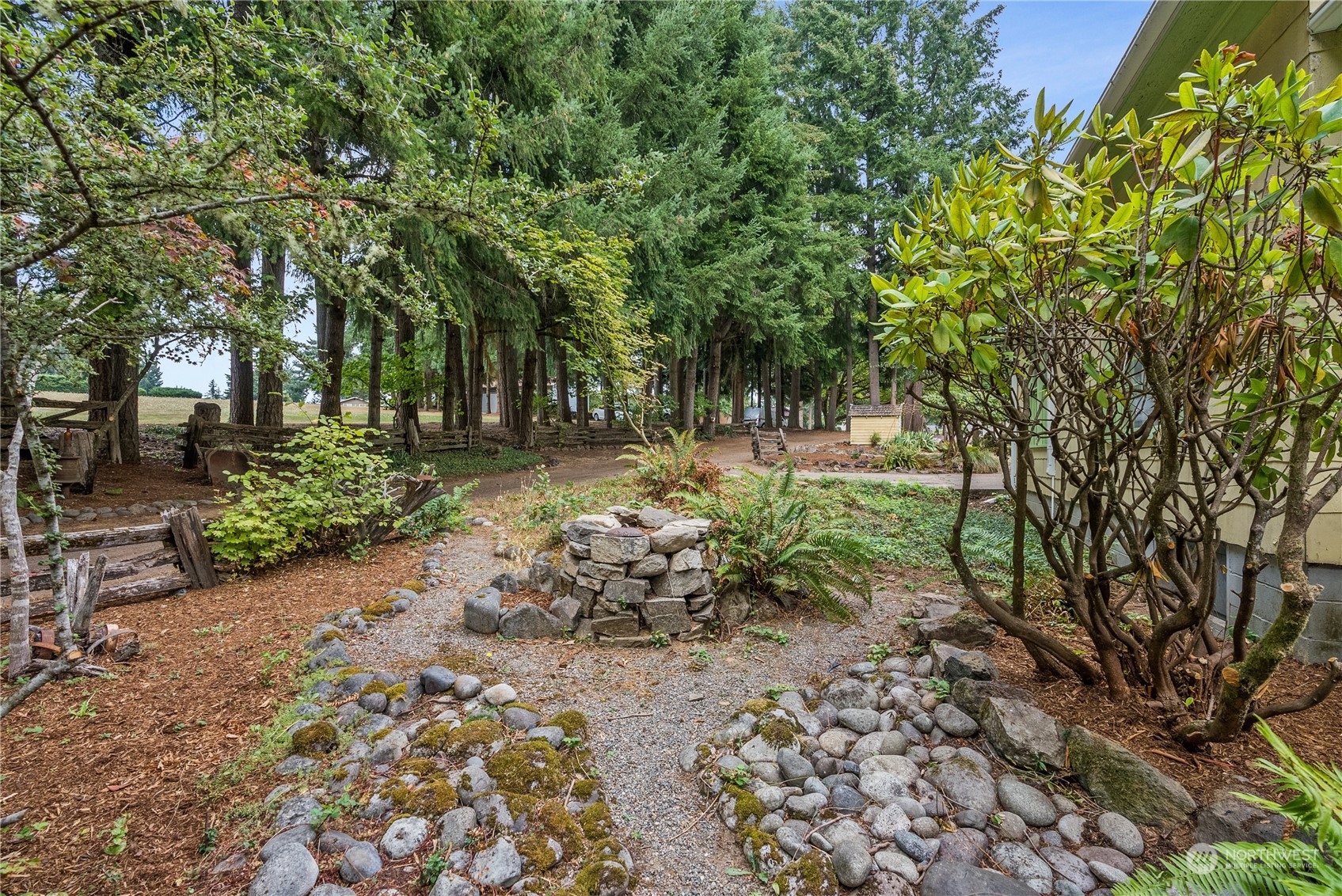 110 Brockway Road Chehalis, WA 98532 - Photo 3 of 27 a backyard of a house with lots of green space