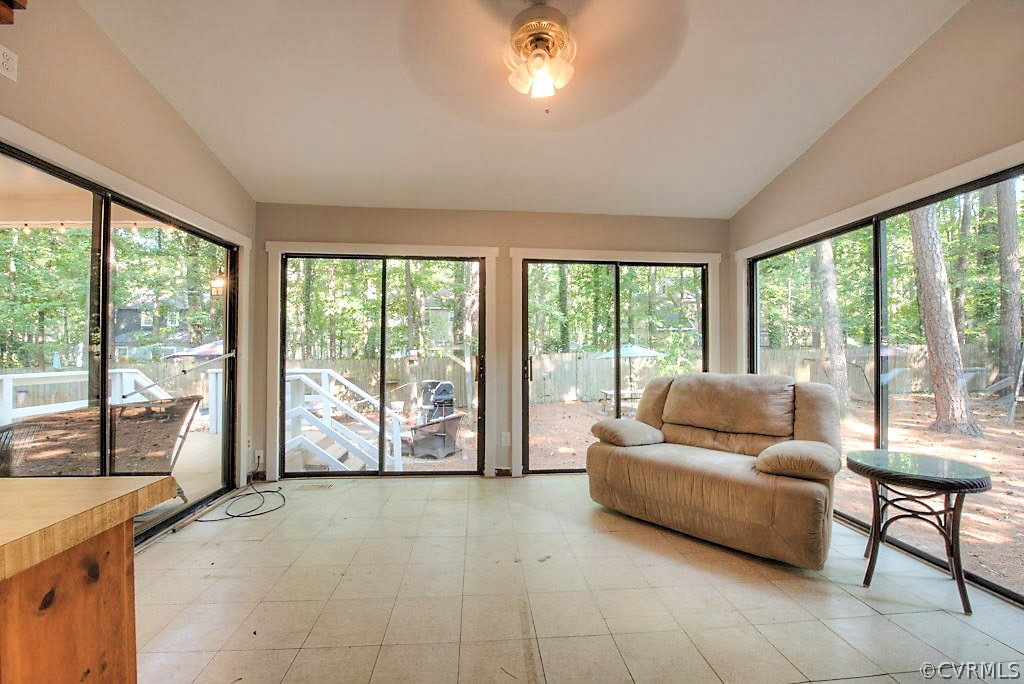 13608 Hunts Bridge Road Midlothian, VA 23112 - Photo 25 of 50 a living room with furniture and large windows