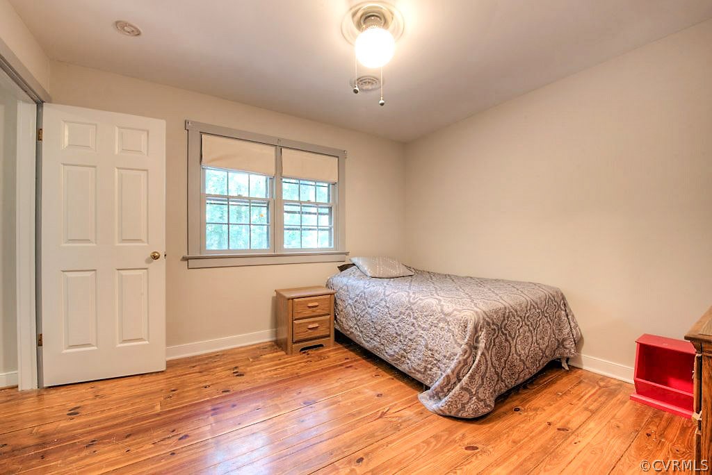 13608 Hunts Bridge Road Midlothian, VA 23112 - Photo 34 of 50 a bedroom with a bed and a window