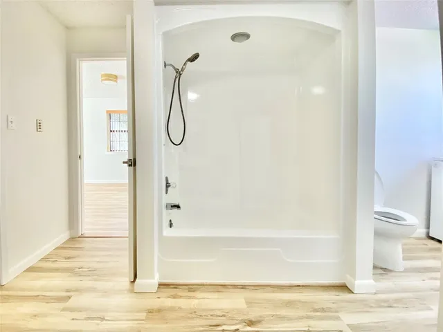 a bathroom with a granite shower