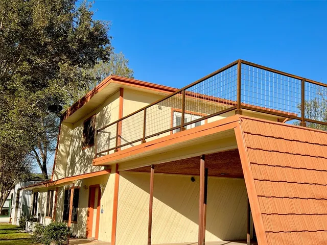 a view of a house with a street