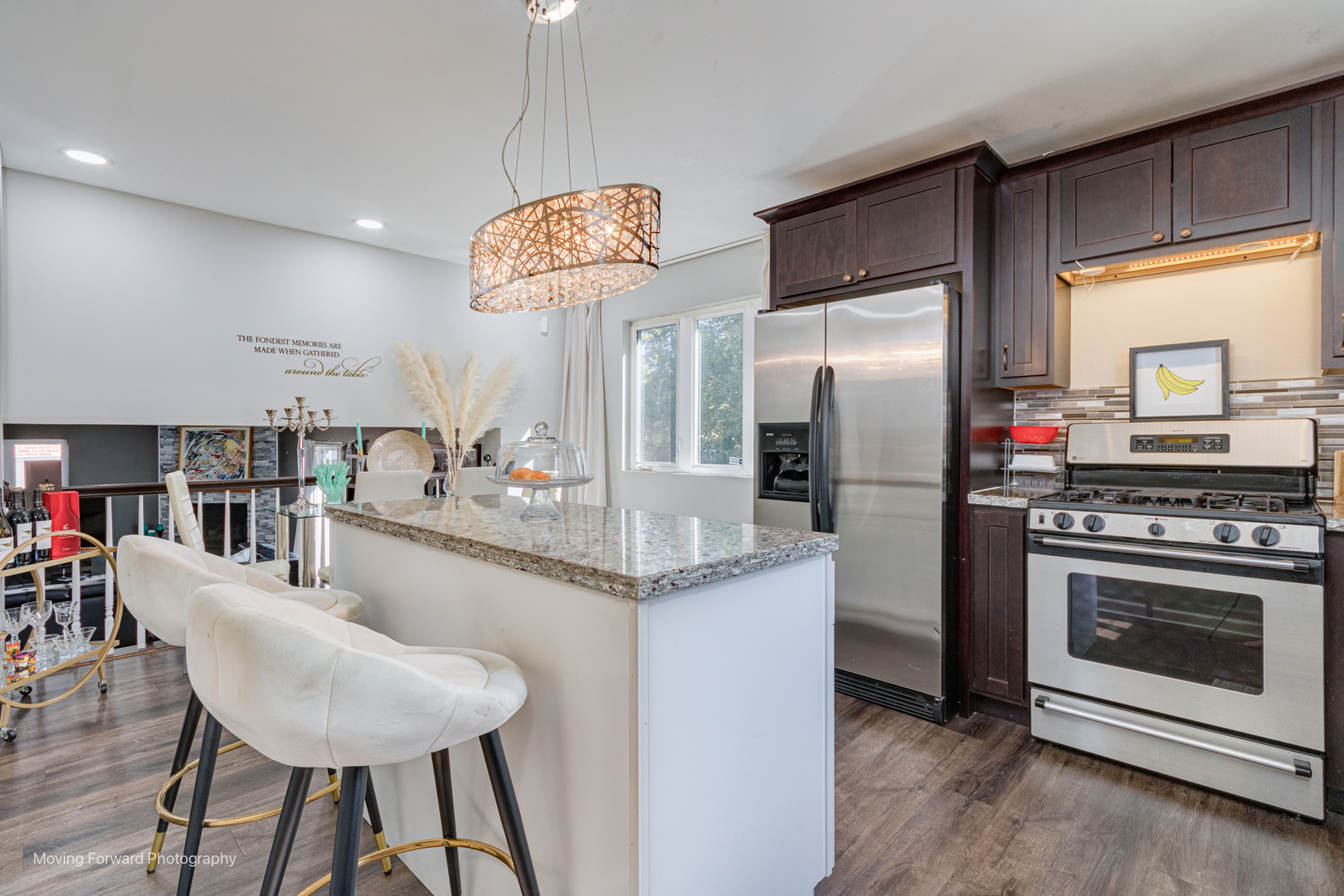 16023 Trumbull Avenue Markham, IL 60428 - Photo 12 of 36 a kitchen with stainless steel appliances granite countertop a stove refrigerator and a view of living room