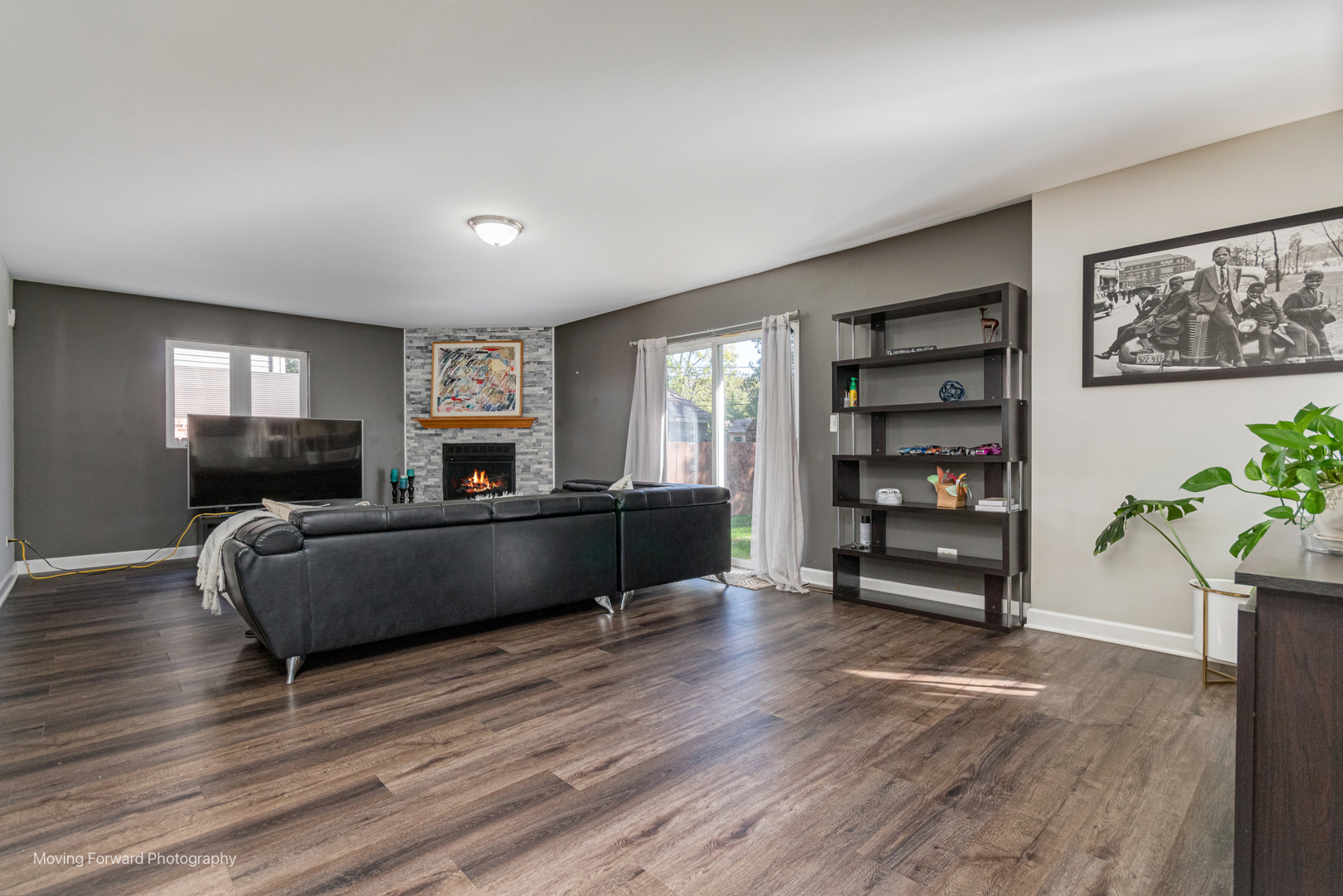 16023 Trumbull Avenue Markham, IL 60428 - Photo 16 of 36 a living room with furniture and wooden floor