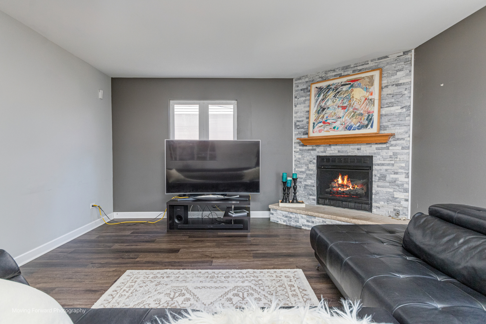 16023 Trumbull Avenue Markham, IL 60428 - Photo 17 of 36 a living room with furniture and a fireplace