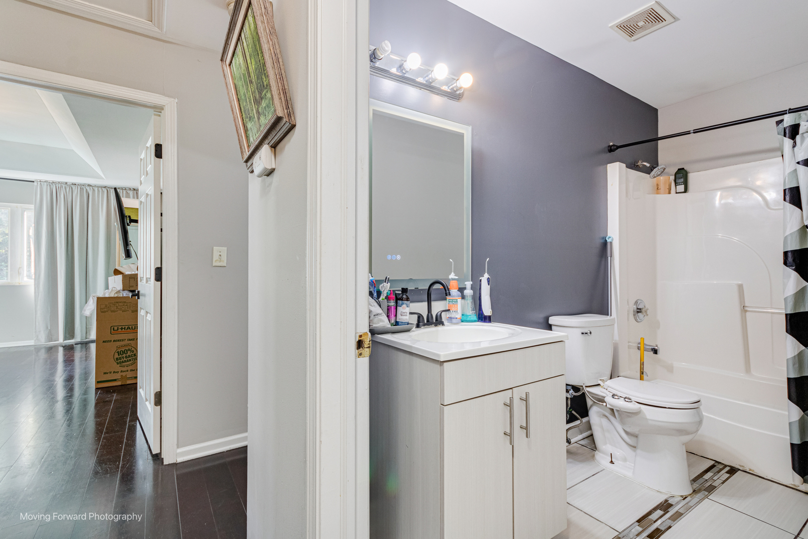 16023 Trumbull Avenue Markham, IL 60428 - Photo 28 of 36 a bathroom with a sink toilet and shower