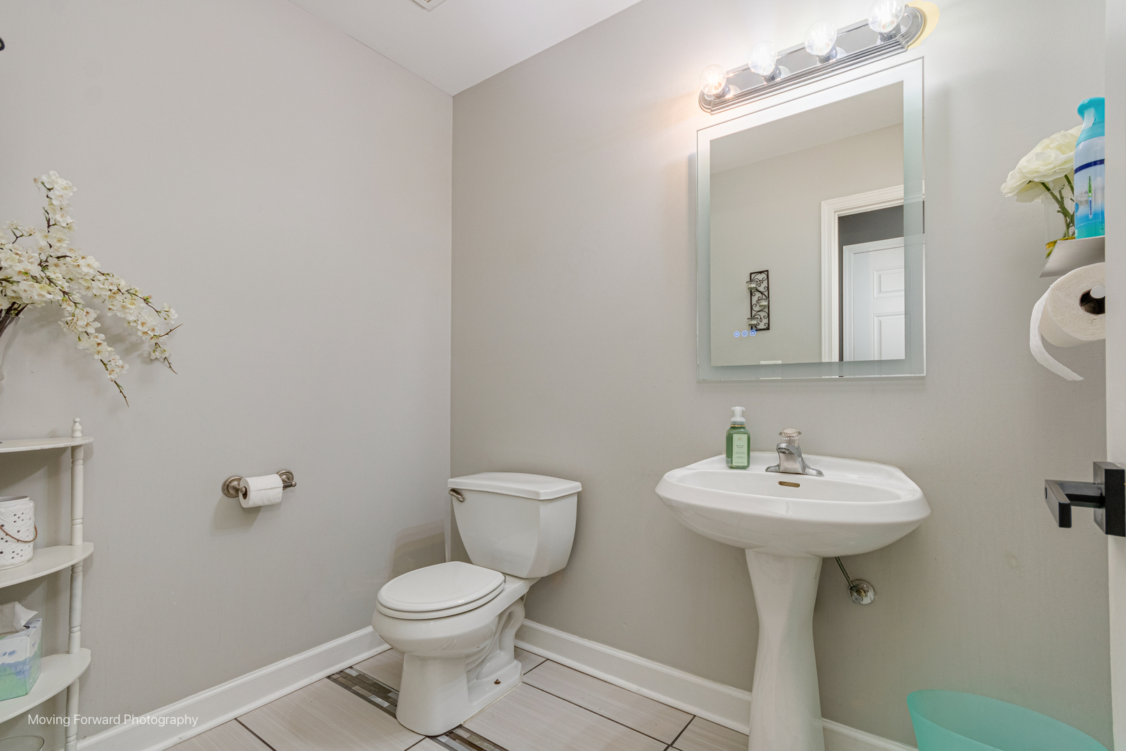 16023 Trumbull Avenue Markham, IL 60428 - Photo 4 of 36 a bathroom with a sink a toilet and mirror