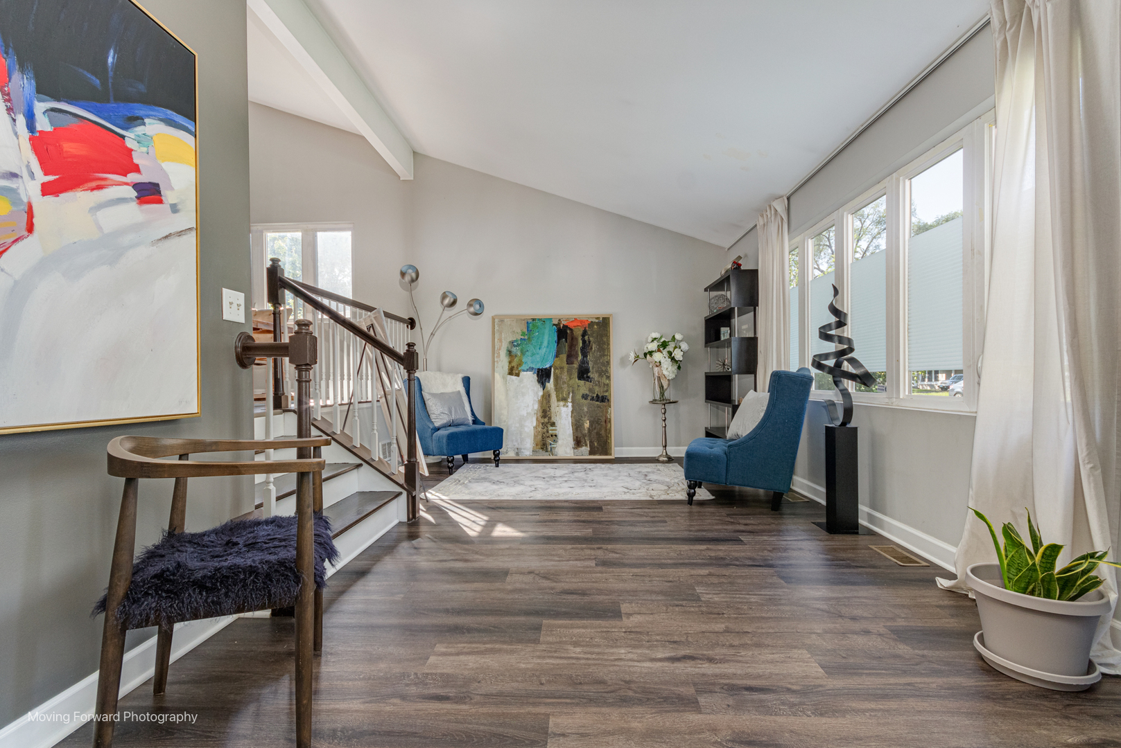 16023 Trumbull Avenue Markham, IL 60428 - Photo 5 of 36 a view of entryway livingroom and hall with wooden floor