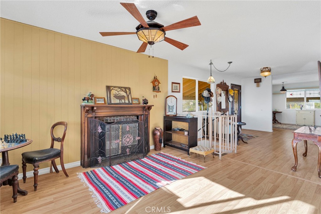 31420 Rabbit Springs Lane Lucerne Valley, CA 92356 - Photo 14 of 72 a bedroom with furniture and a fireplace