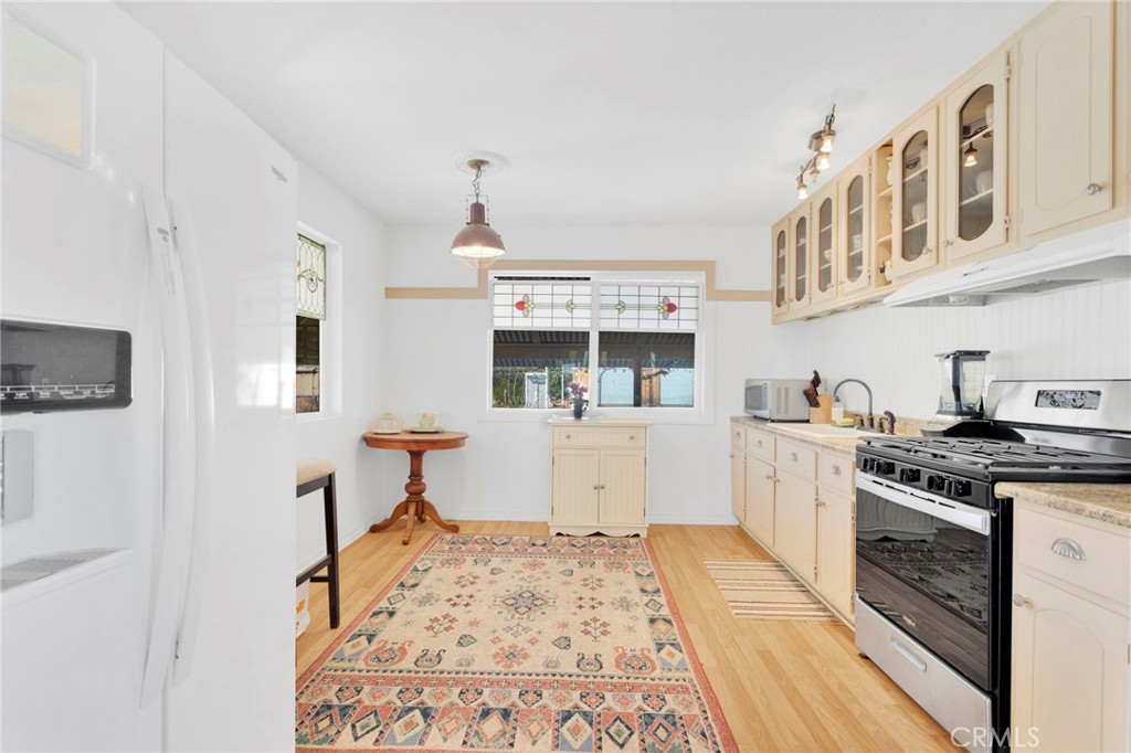 31420 Rabbit Springs Lane Lucerne Valley, CA 92356 - Photo 17 of 72 a kitchen with stainless steel appliances granite countertop a stove and a sink