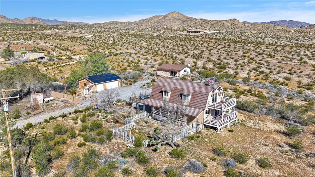 31420 Rabbit Springs Lane Lucerne Valley, CA 92356 - Photo 25 of 72 a view of a house with a mountain