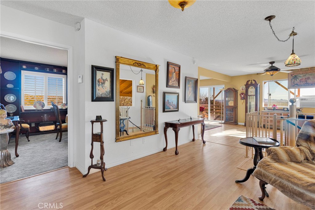 31420 Rabbit Springs Lane Lucerne Valley, CA 92356 - Photo 4 of 72 a livingroom with furniture and wooden floor