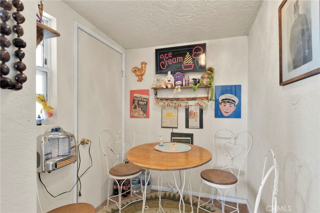31420 Rabbit Springs Lane Lucerne Valley, CA 92356 - Photo 55 of 72 a living room with furniture and a table