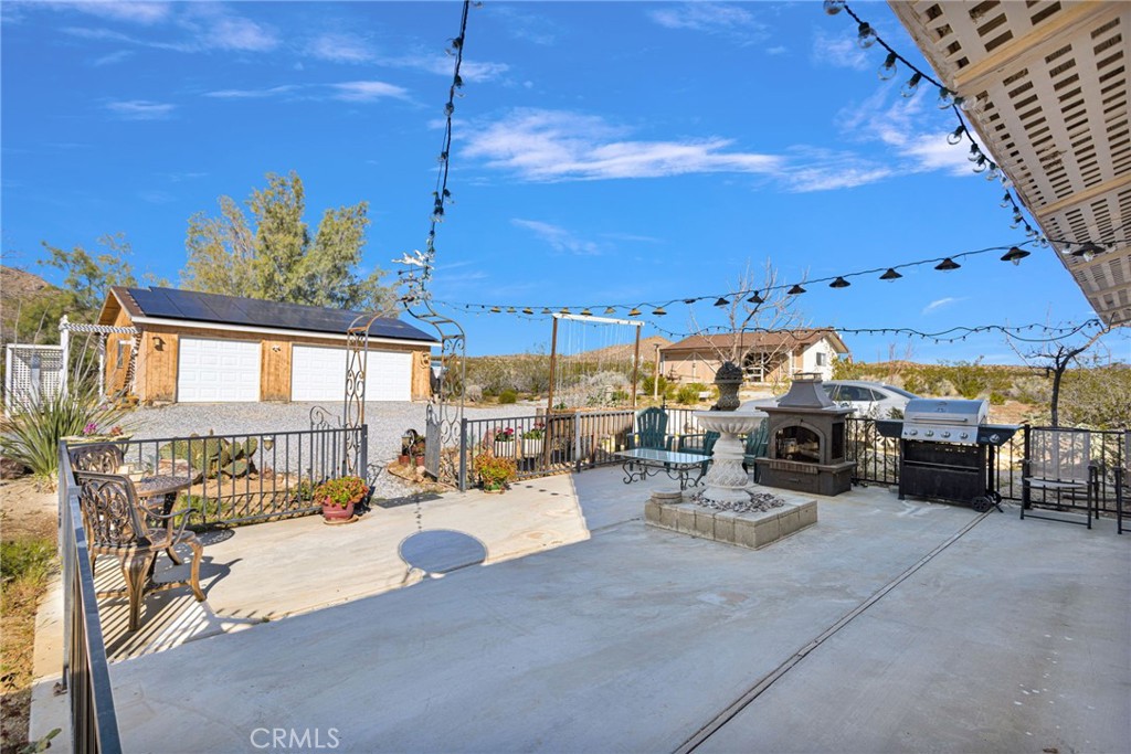31420 Rabbit Springs Lane Lucerne Valley, CA 92356 - Photo 66 of 72 a view of a terrace with seating area