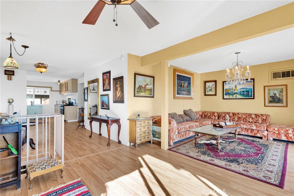 31420 Rabbit Springs Lane Lucerne Valley, CA 92356 - Photo 8 of 72 a living room with lots of furniture and a rug