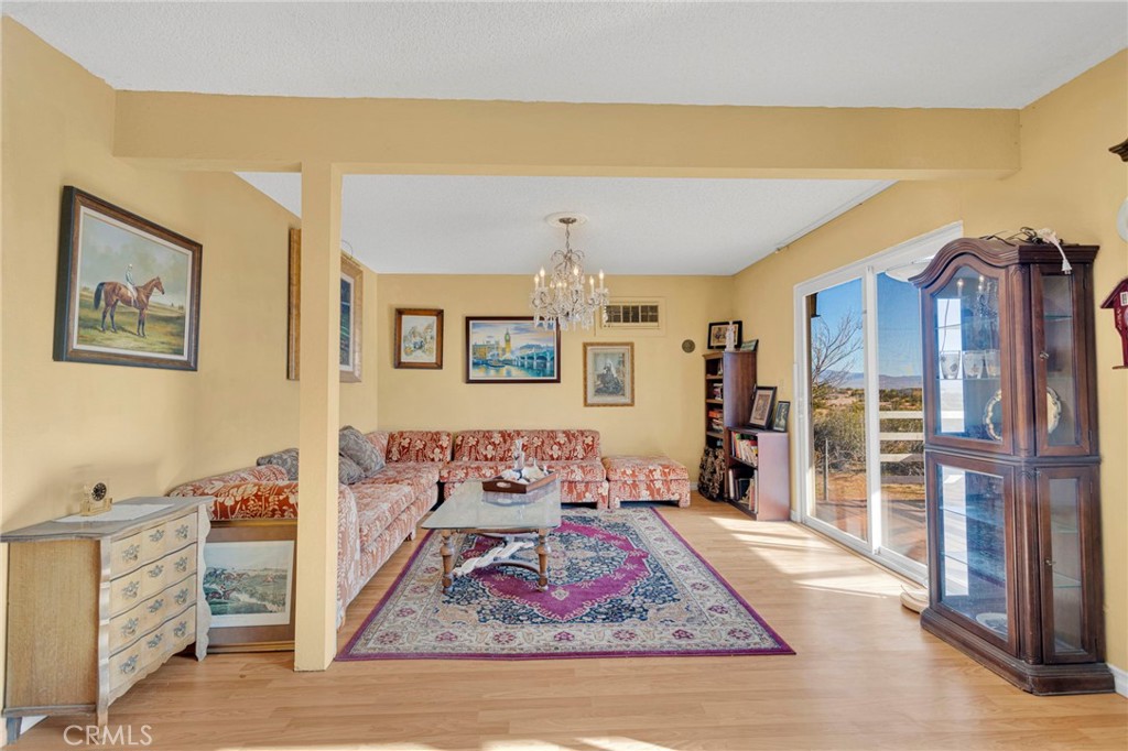 31420 Rabbit Springs Lane Lucerne Valley, CA 92356 - Photo 9 of 72 a living room with furniture and a rug