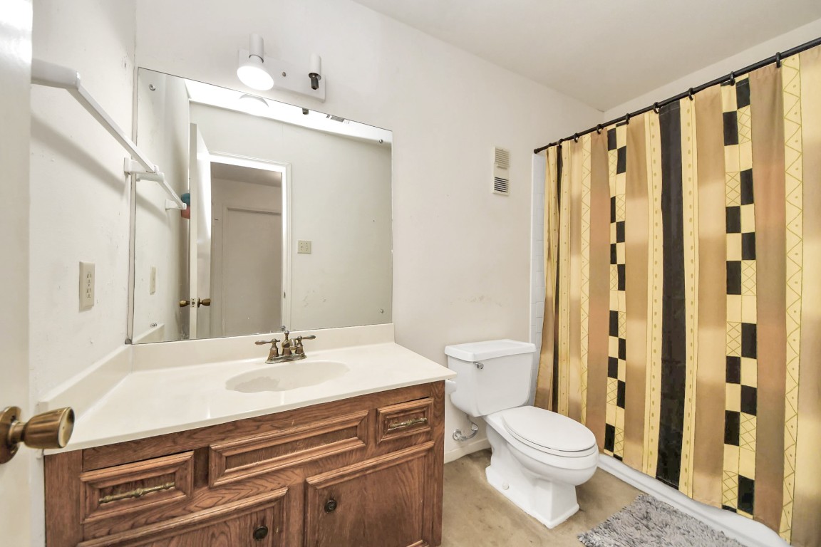 7728 Challie Lane Houston, TX 77088 - Photo 22 of 28 a bathroom with a sink toilet and shower
