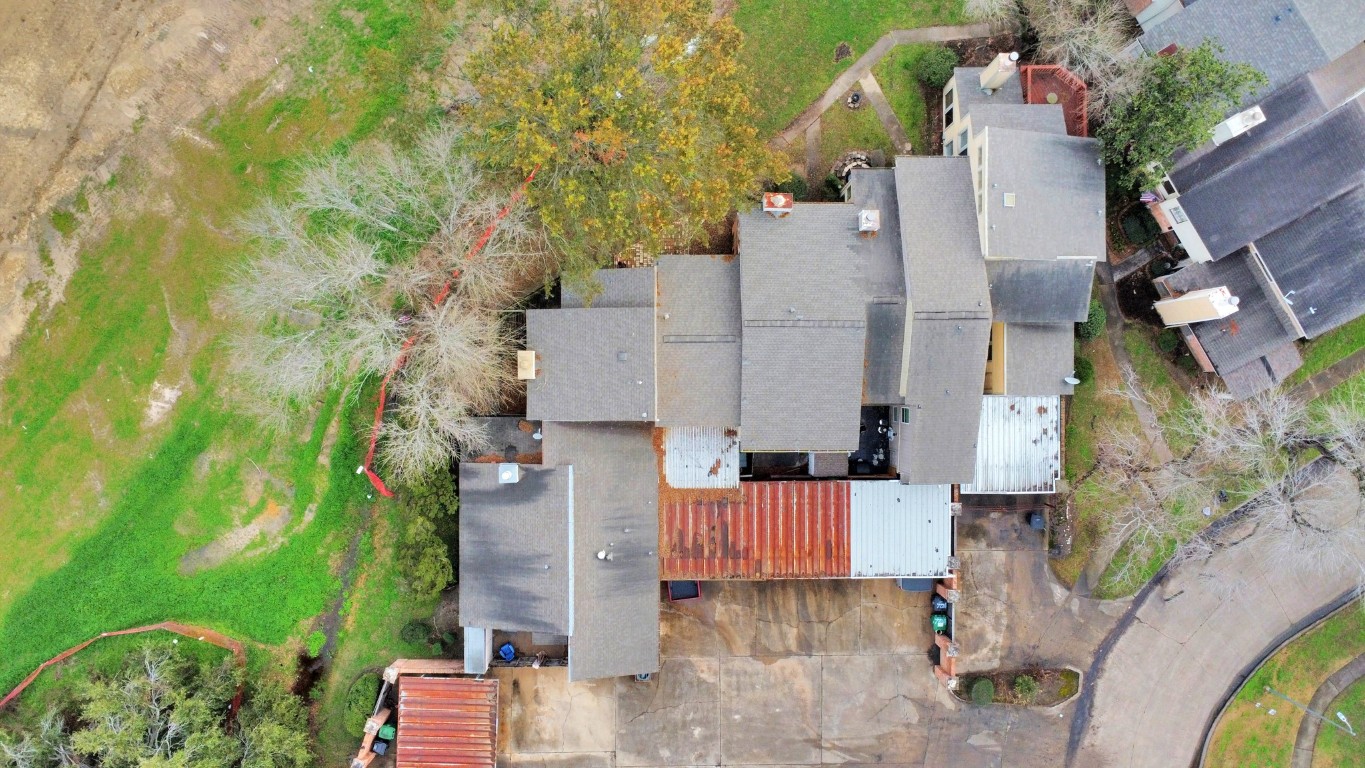7728 Challie Lane Houston, TX 77088 - Photo 27 of 28 an aerial view of residential houses with outdoor space