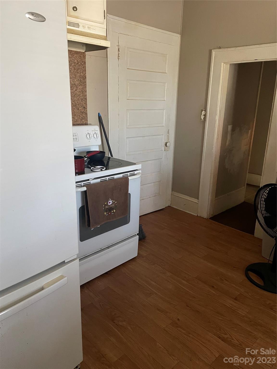 1271 Springdale Road Lancaster, SC 29720 - Photo 5 of 12 a kitchen with stainless steel appliances a stove and a refrigerator