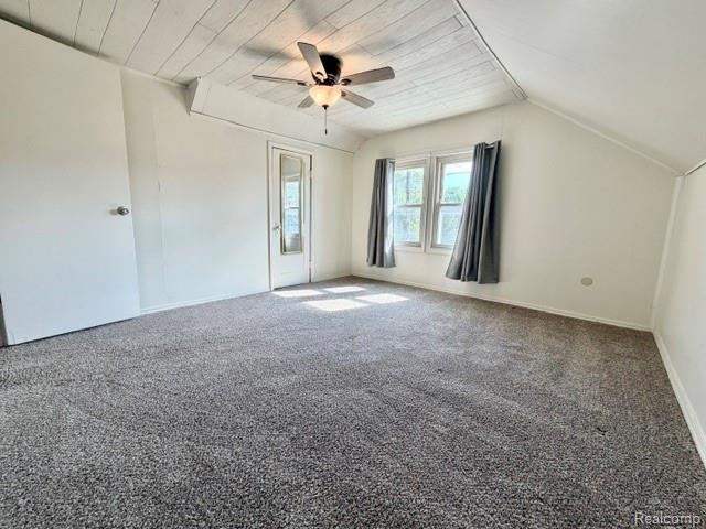 2840 Miller Road Flint, MI 48503 - Photo 25 of 49 Vaulted wood-finish ceiling, ceiling fan with integrated lighting, gray carpeted flooring, and a window with natural light