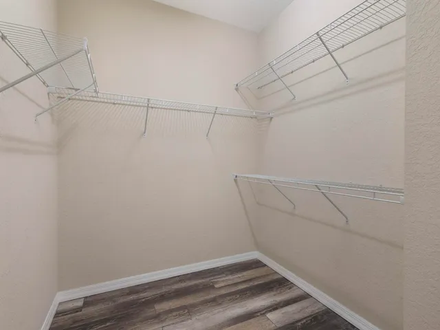 a house view with a seating space and garden