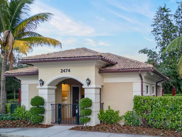 a view of a backyard with sitting area and furniture