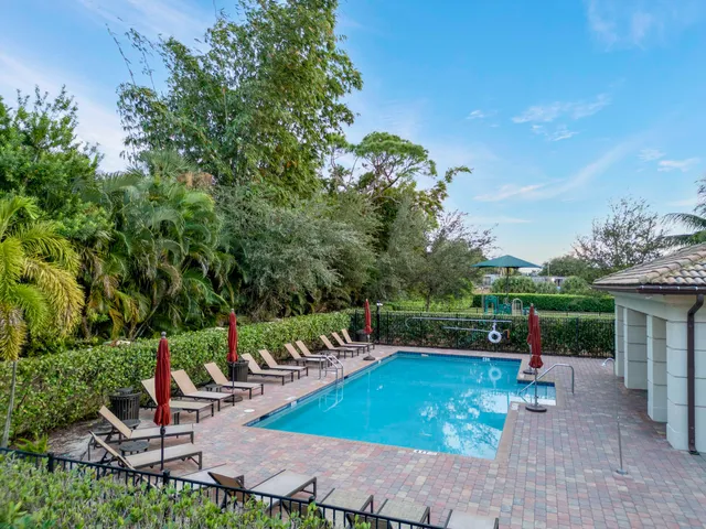 a childrens park with lots of swings and slides