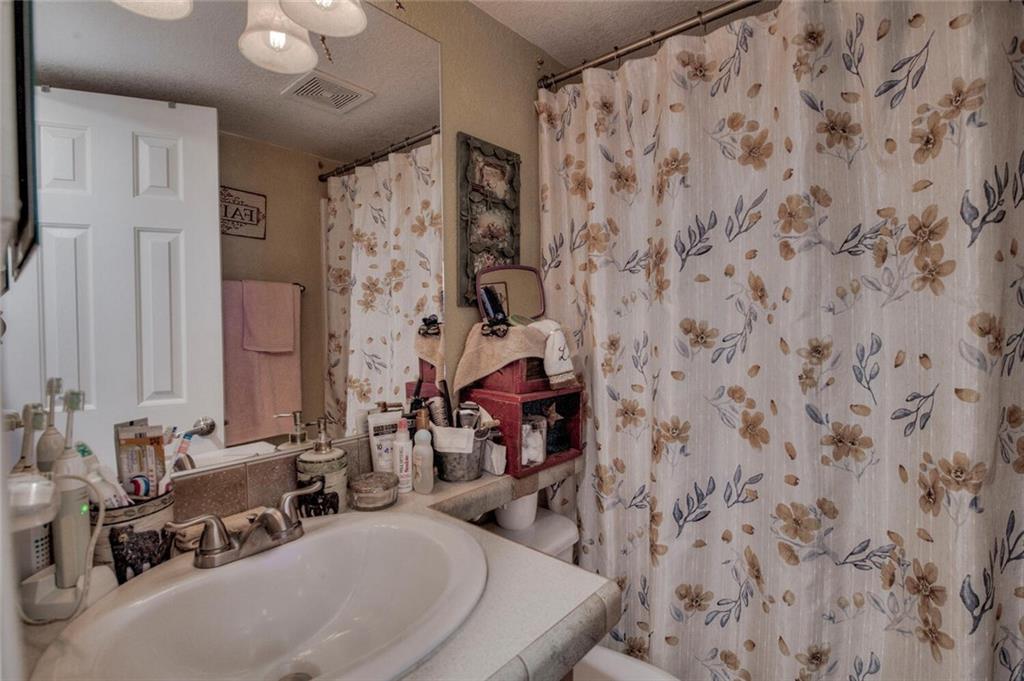92 Sunshine Loop Fairplay, CO 80440 - Photo 20 of 35 a bathroom with a sink and a mirror
