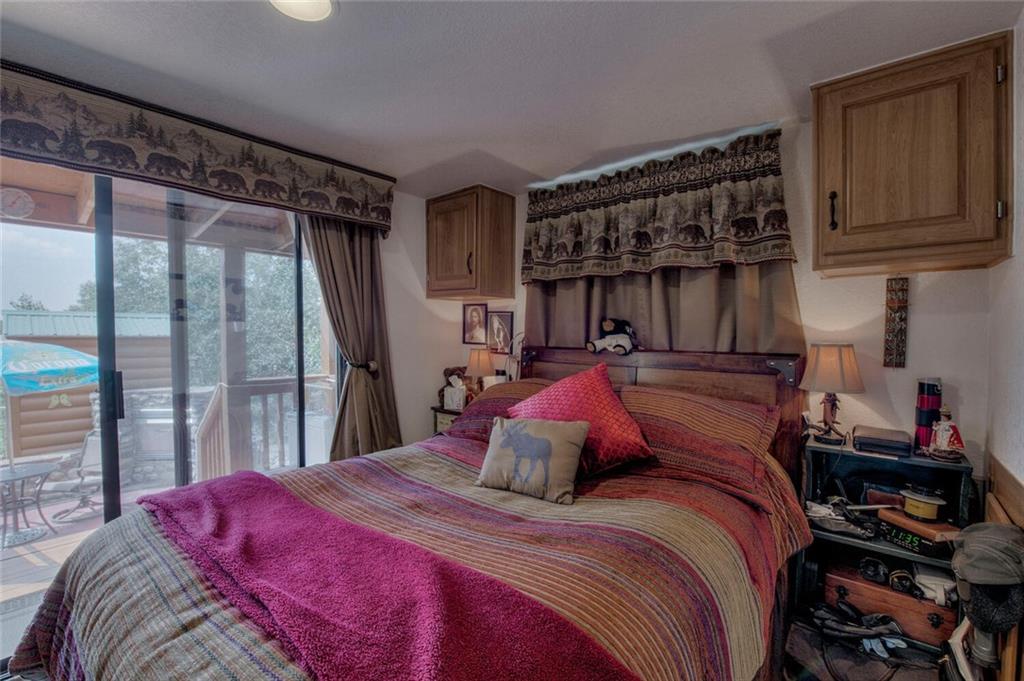 92 Sunshine Loop Fairplay, CO 80440 - Photo 27 of 35 a bedroom with a bed and a window