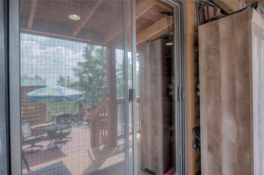 92 Sunshine Loop Fairplay, CO 80440 - Photo 30 of 35 a bathroom with a glass door