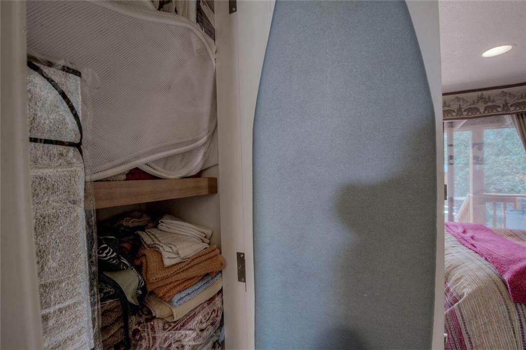 92 Sunshine Loop Fairplay, CO 80440 - Photo 31 of 35 a view of walk in closet with clothes and shoes