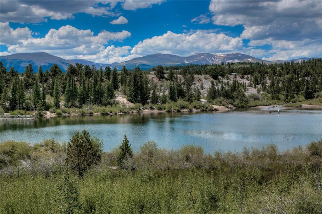 92 Sunshine Loop Fairplay, CO 80440 - Photo 34 of 35 a view of a lake with a house in the background