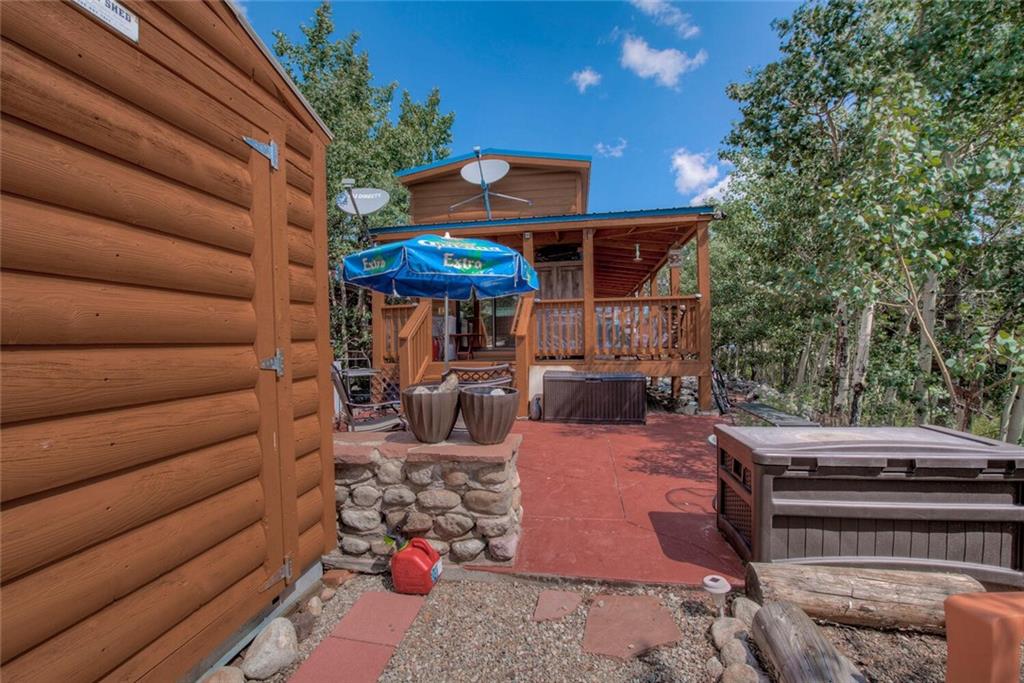 92 Sunshine Loop Fairplay, CO 80440 - Photo 8 of 35 a view of a patio with couches and potted plants