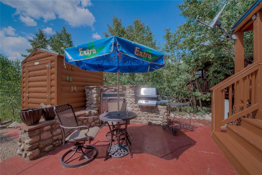 92 Sunshine Loop Fairplay, CO 80440 - Photo 10 of 35 a view of a chairs and table in backyard