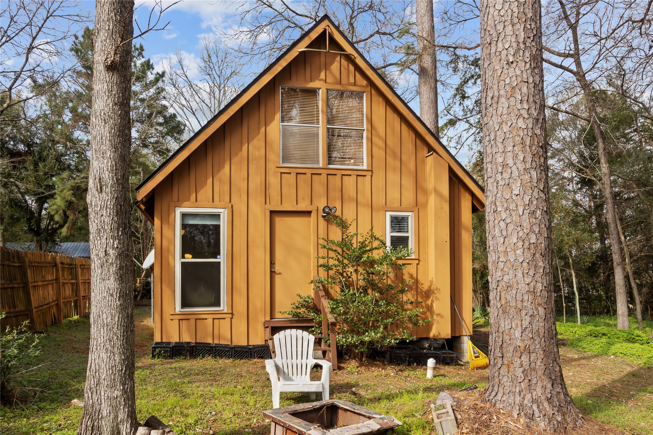 20 Shannon Street Huntsville, TX 77320 - Photo 22 of 29 a view of backyard of house with green space
