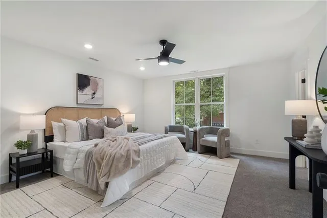 a bathroom with a sink a toilet a shower