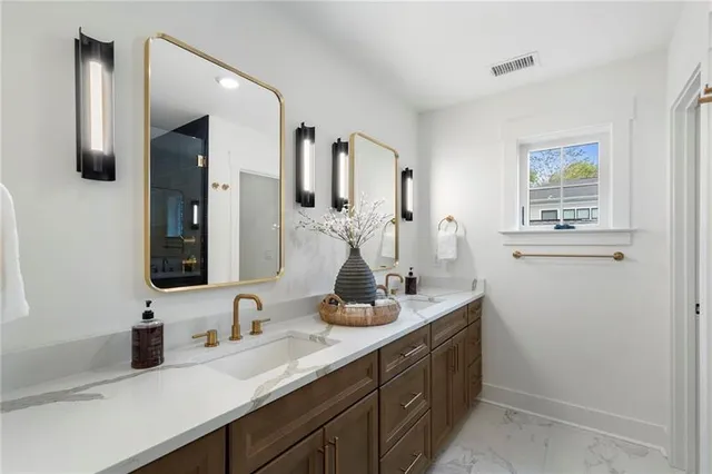 a bathroom with a sink a toilet and a bathtub