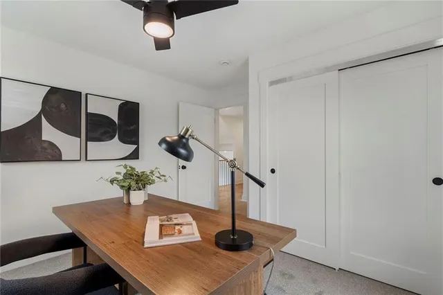 a view of a yard in front of a house with garage