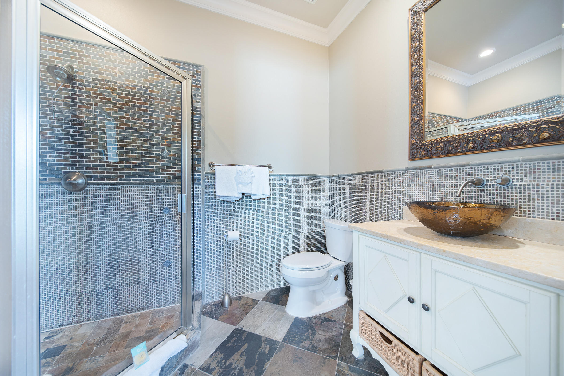 4836 Ocean Boulevard Destin, FL 32541 - Photo 48 of 71 a bathroom with a sink a toilet and shower