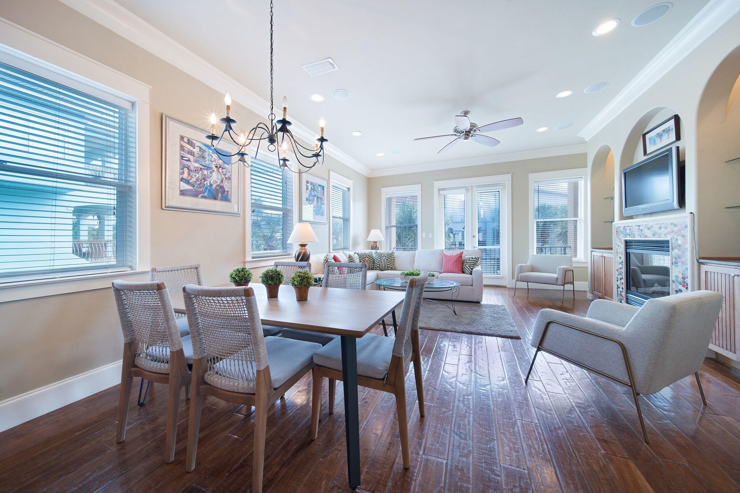 4836 Ocean Boulevard Destin, FL 32541 - Photo 6 of 71 a view of a dining room with furniture window and wooden floor