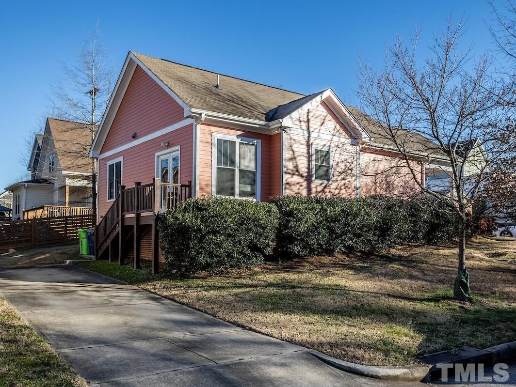 805 East Jones Street Raleigh, NC 27601 - Photo 19 of 24 a view of a house with a yard