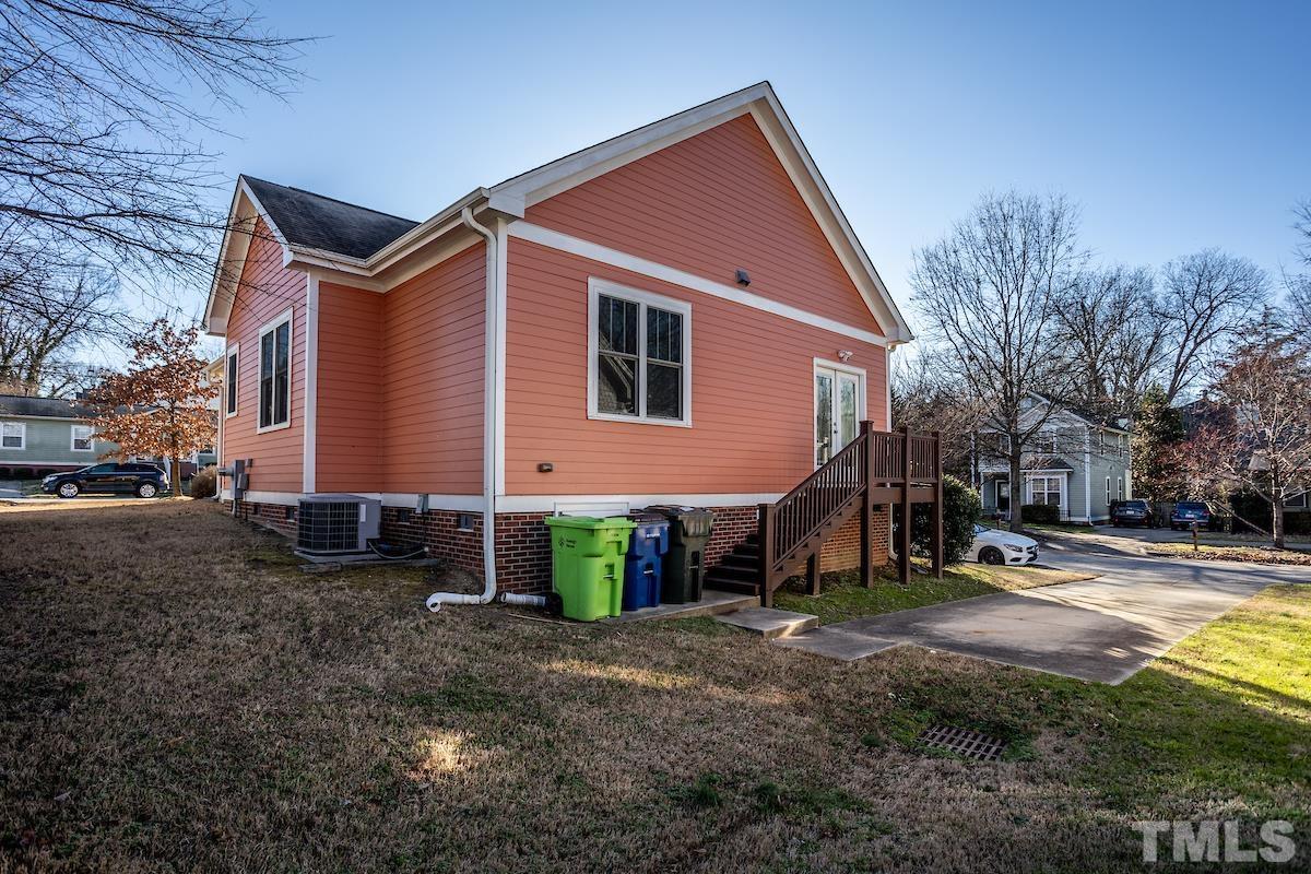805 East Jones Street Raleigh, NC 27601 - Photo 20 of 24 a front view of a house with a yard