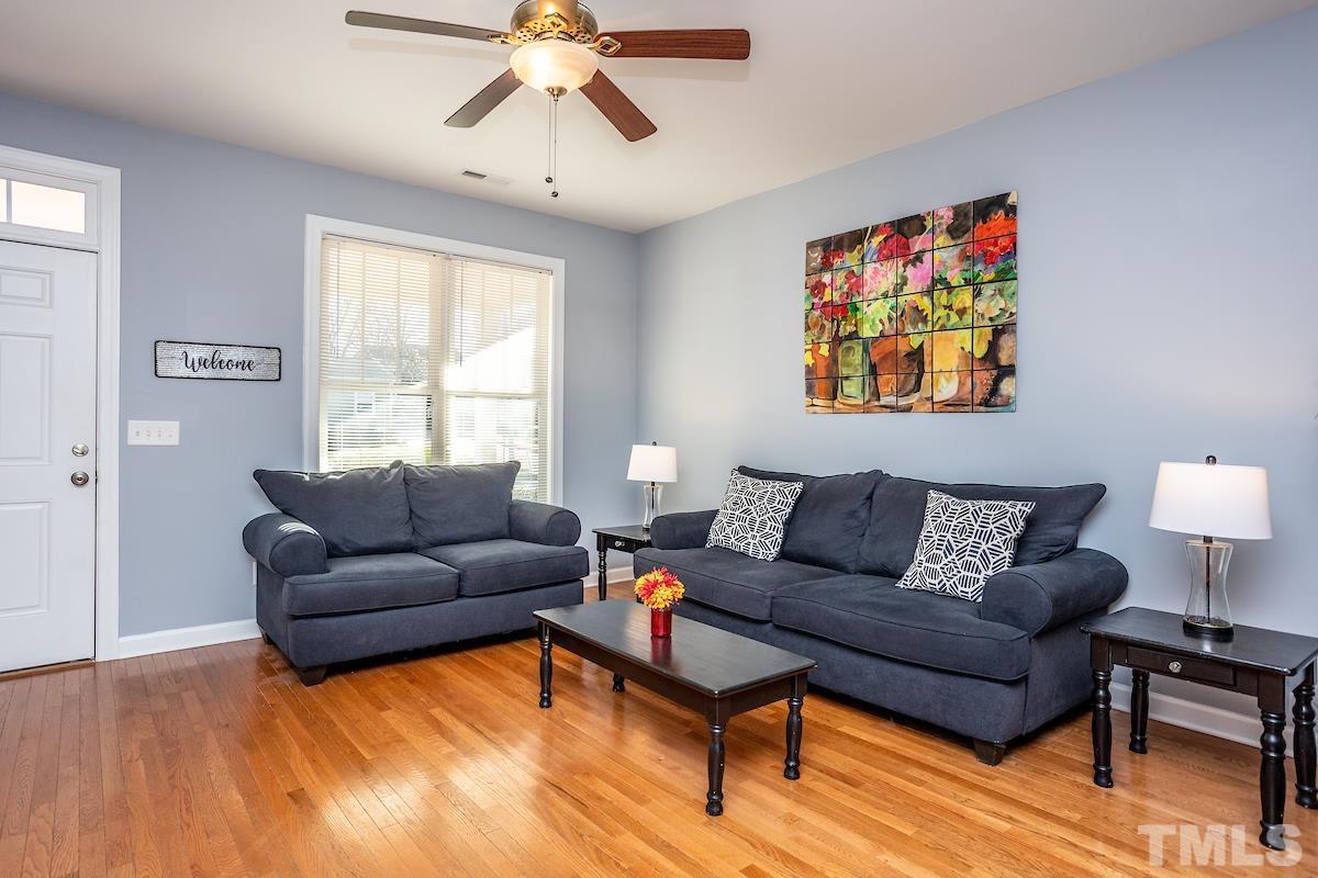 805 East Jones Street Raleigh, NC 27601 - Photo 3 of 24 a living room with furniture and a window