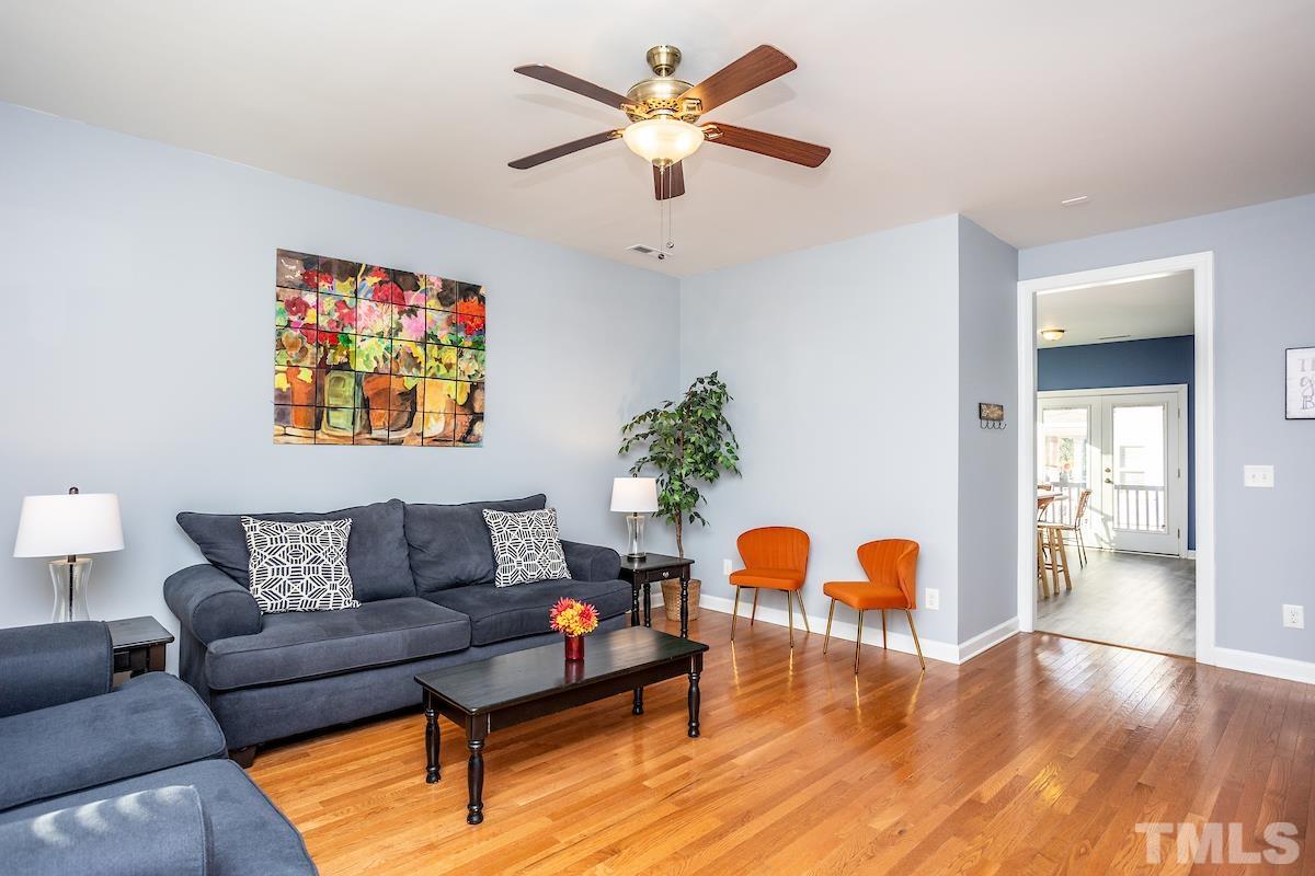 805 East Jones Street Raleigh, NC 27601 - Photo 4 of 24 a living room with furniture and wooden floor