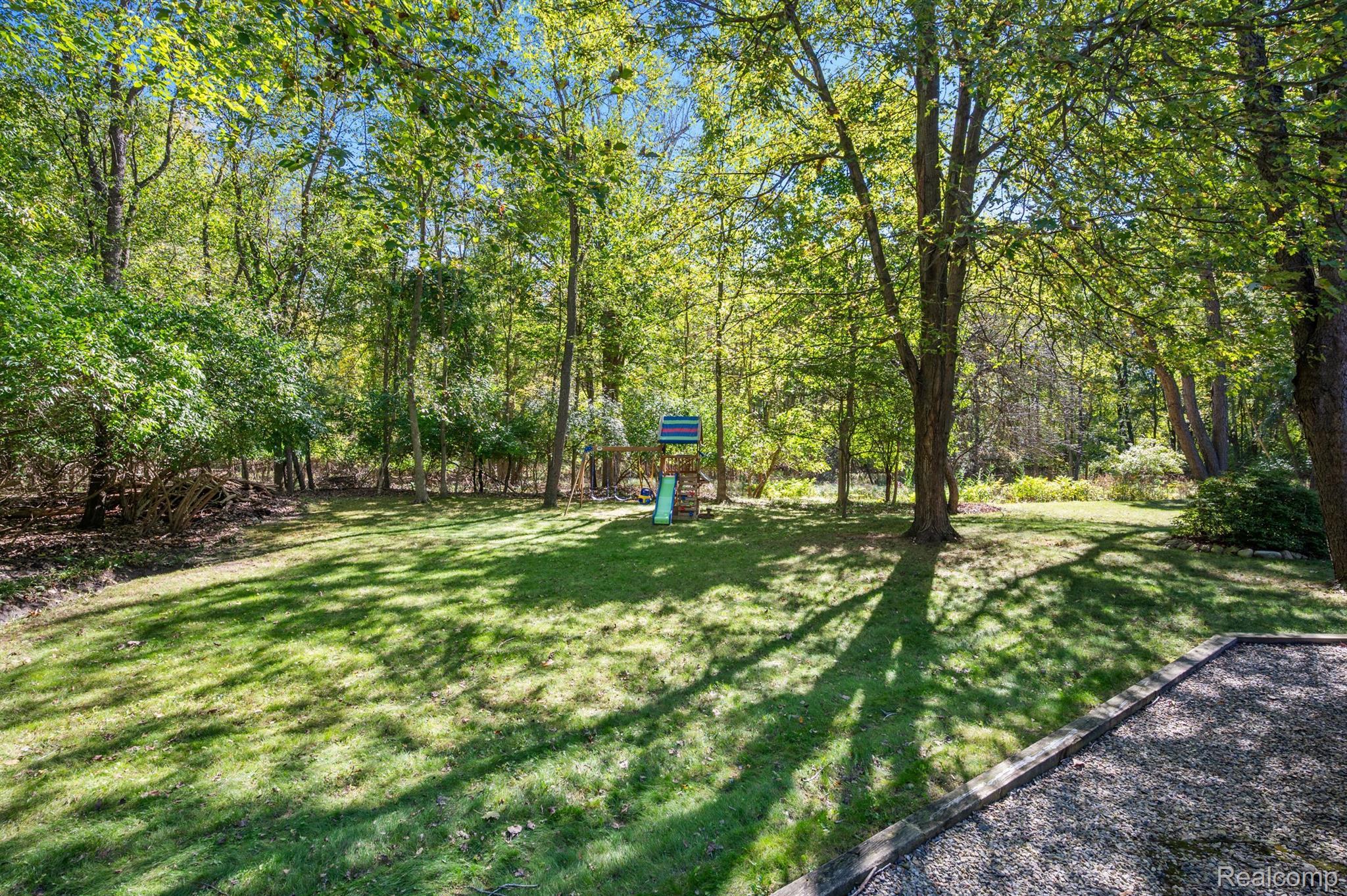713 River Bend Drive Rochester, MI 48307 - Photo 54 of 68 Private wooded backyard